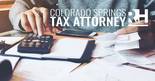 Picture of someone getting their tax information ready for their Colorado Springs tax lawyer